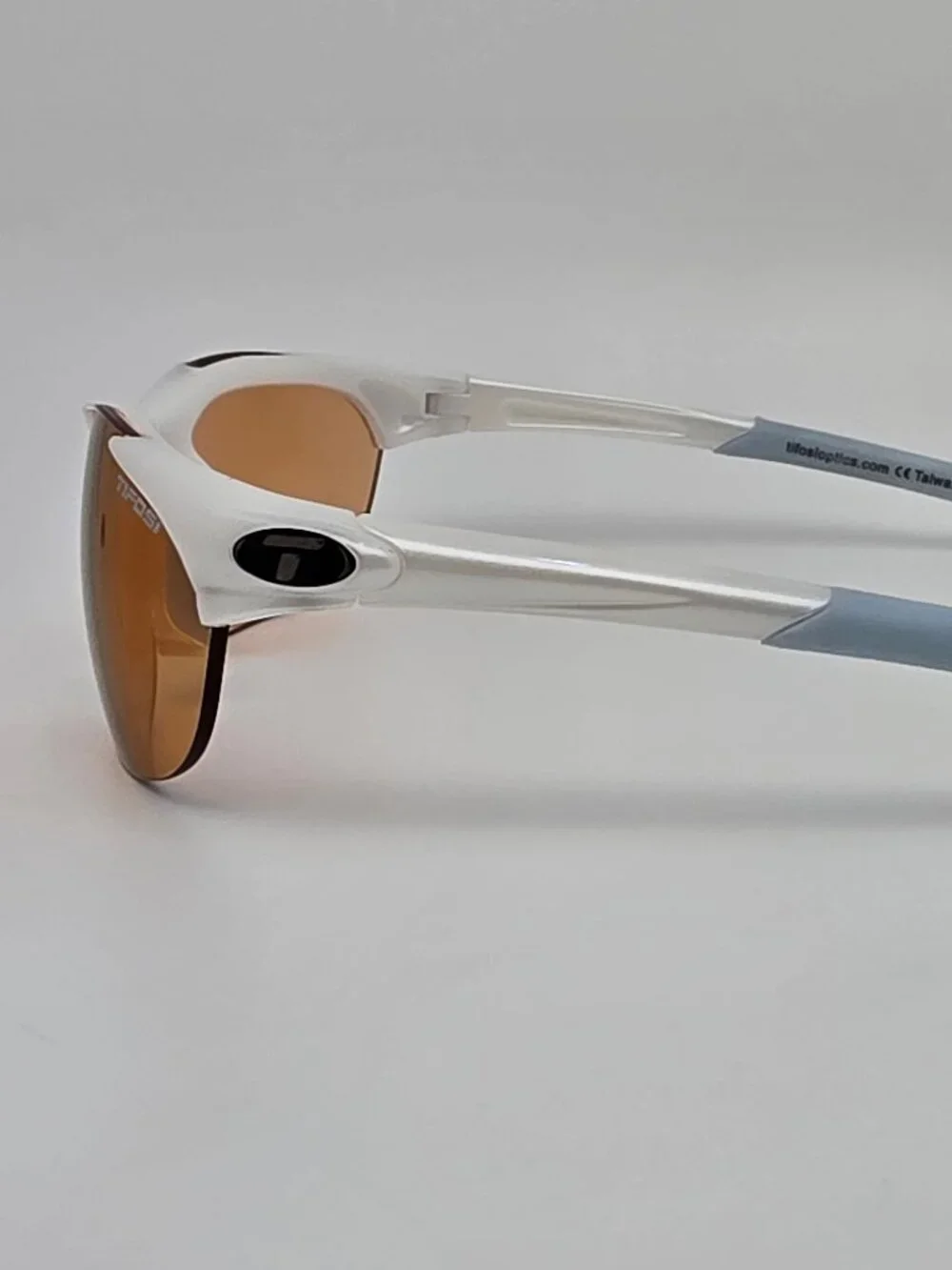 Tifosi Wisp Pearl White Baby Blue Frame Purple Mirror Lens Rimless Sunglasses